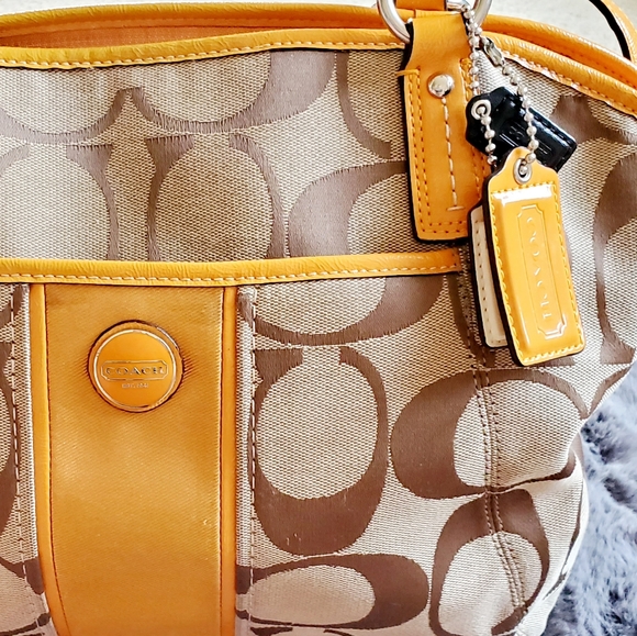 coach purse straps peeling